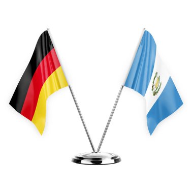 Two table flags isolated on white background 3d illustration, germany and guatemala