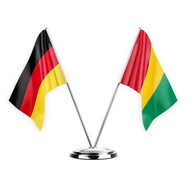 Two table flags isolated on white background 3d illustration, germany and guinea