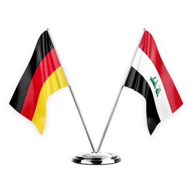 Two table flags isolated on white background 3d illustration, germany and iraq