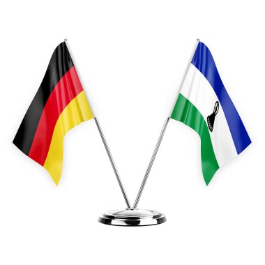 Two table flags isolated on white background 3d illustration, germany and lesotho
