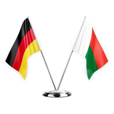 Two table flags isolated on white background 3d illustration, germany and madagascar