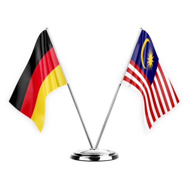 Two table flags isolated on white background 3d illustration, germany and malaysia