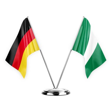 Two table flags isolated on white background 3d illustration, germany and nigeria