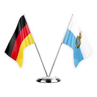 Two table flags isolated on white background 3d illustration, germany and san marino
