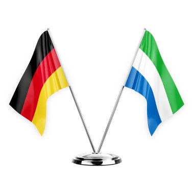 Two table flags isolated on white background 3d illustration, germany and sierra leone