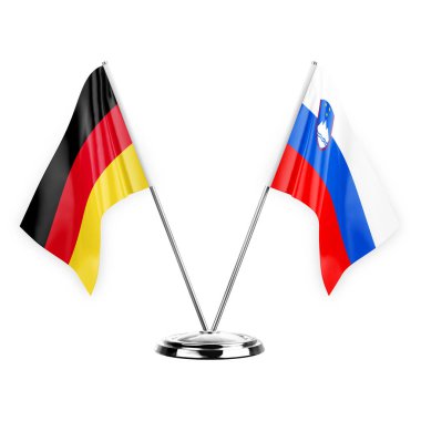 Two table flags isolated on white background 3d illustration, germany and slovenia