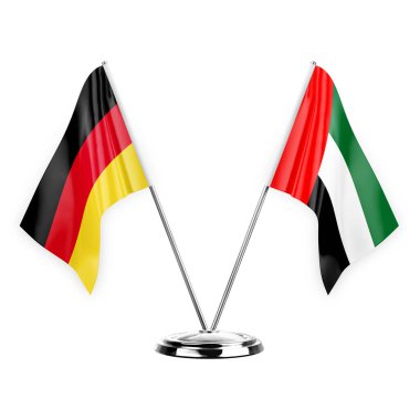 Two table flags isolated on white background 3d illustration, germany and united arab emirates