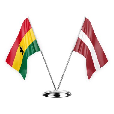 Two table flags isolated on white background 3d illustration, ghana and latvia