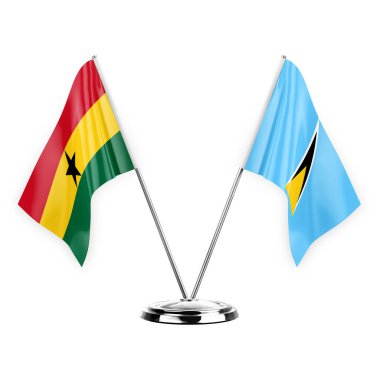 Two table flags isolated on white background 3d illustration, ghana and saint lucia