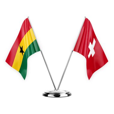 Two table flags isolated on white background 3d illustration, ghana and switzerland
