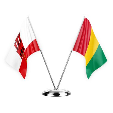 Two table flags isolated on white background 3d illustration, gibraltar and guinea