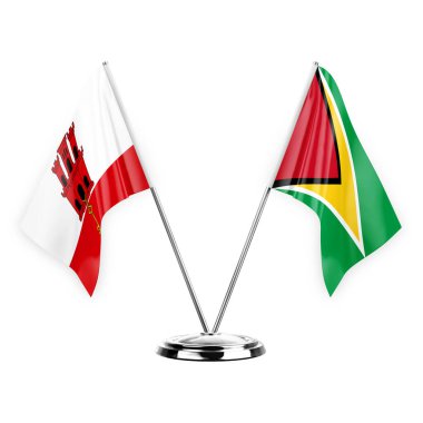 Two table flags isolated on white background 3d illustration, gibraltar and guyana