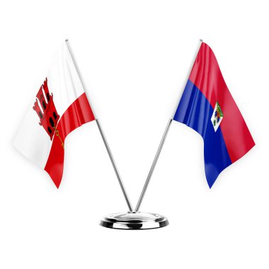 Two table flags isolated on white background 3d illustration, gibraltar and haiti