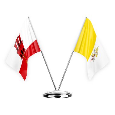 Two table flags isolated on white background 3d illustration, gibraltar and holy see
