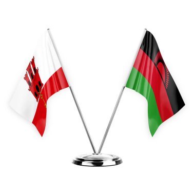 Two table flags isolated on white background 3d illustration, gibraltar and malawi