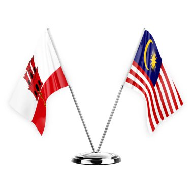 Two table flags isolated on white background 3d illustration, gibraltar and malaysia