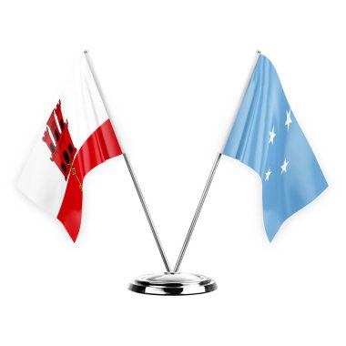 Two table flags isolated on white background 3d illustration, gibraltar and micronesia