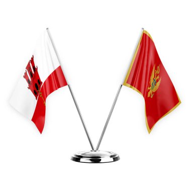 Two table flags isolated on white background 3d illustration, gibraltar and montenegro