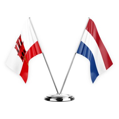 Two table flags isolated on white background 3d illustration, gibraltar and netherlands