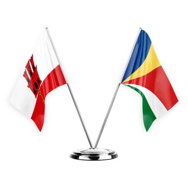 Two table flags isolated on white background 3d illustration, gibraltar and seychelles