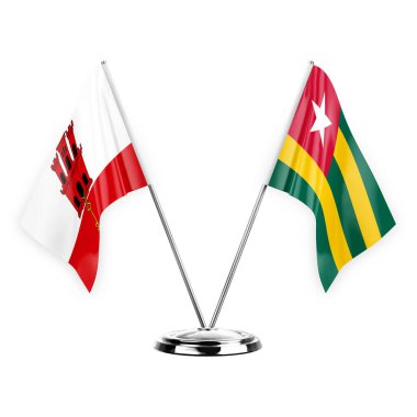 Two table flags isolated on white background 3d illustration, gibraltar and togo