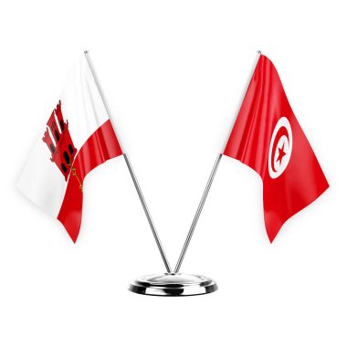 Two table flags isolated on white background 3d illustration, gibraltar and tunisia
