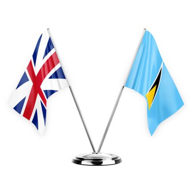 Two table flags isolated on white background 3d illustration, great britain and saint lucia