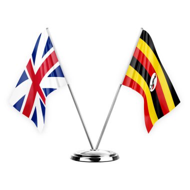 Two table flags isolated on white background 3d illustration, great britain and uganda
