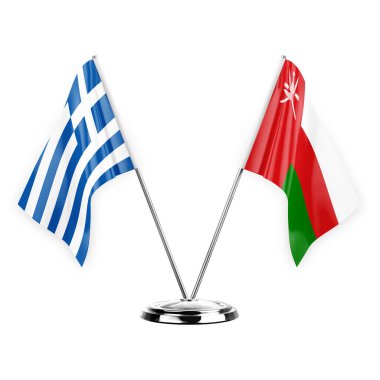 Two table flags isolated on white background 3d illustration, greece and oman