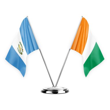 Two table flags isolated on white background 3d illustration, guatemala and ivory coast