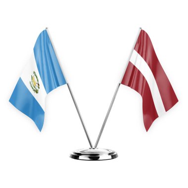Two table flags isolated on white background 3d illustration, guatemala and latvia