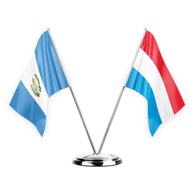 Two table flags isolated on white background 3d illustration, guatemala and luxembourg