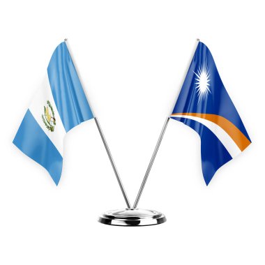 Two table flags isolated on white background 3d illustration, guatemala and marshall islands