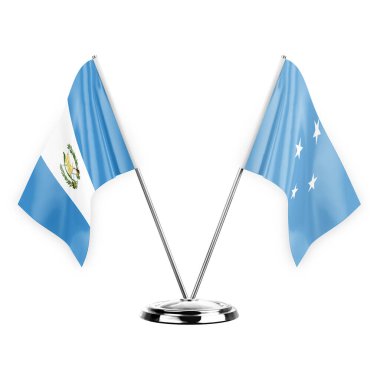 Two table flags isolated on white background 3d illustration, guatemala and micronesia
