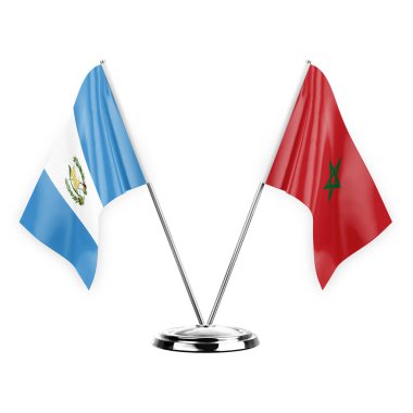 Two table flags isolated on white background 3d illustration, guatemala and morocco