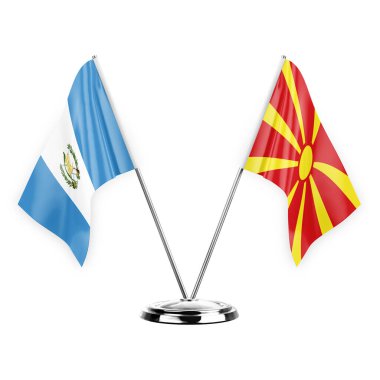 Two table flags isolated on white background 3d illustration, guatemala and north macedonia