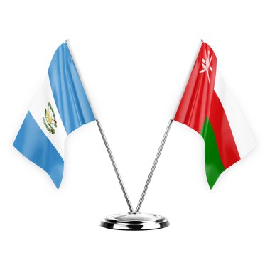 Two table flags isolated on white background 3d illustration, guatemala and oman