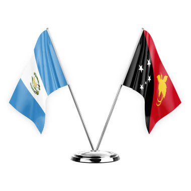 Two table flags isolated on white background 3d illustration, guatemala and papua new guinea