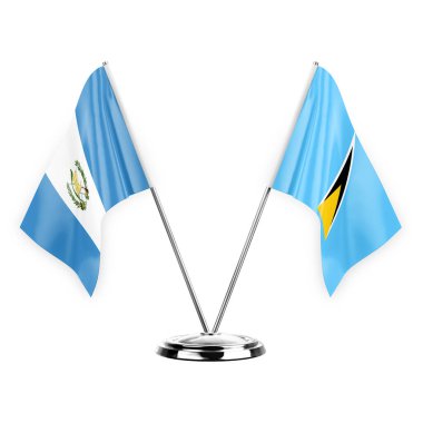 Two table flags isolated on white background 3d illustration, guatemala and saint lucia