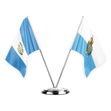 Two table flags isolated on white background 3d illustration, guatemala and san marino