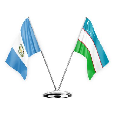 Two table flags isolated on white background 3d illustration, guatemala and uzbekistan