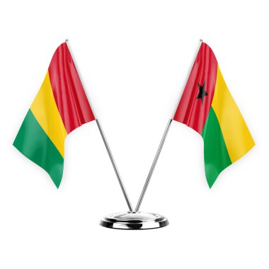 Two table flags isolated on white background 3d illustration, guinea and guinea-bissau