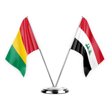 Two table flags isolated on white background 3d illustration, guinea and iraq