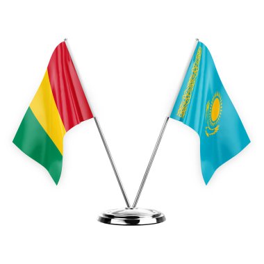 Two table flags isolated on white background 3d illustration, guinea and kazakhstan