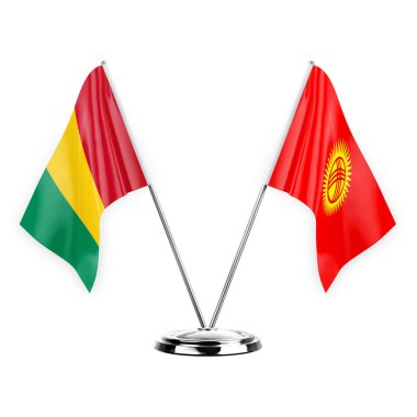 Two table flags isolated on white background 3d illustration, guinea and kyrgyzstan