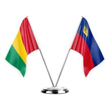 Two table flags isolated on white background 3d illustration, guinea and liechtenstein