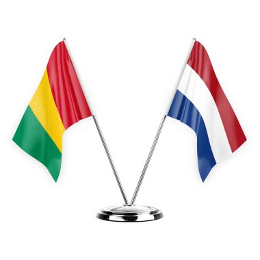 Two table flags isolated on white background 3d illustration, guinea and netherlands
