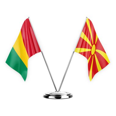 Two table flags isolated on white background 3d illustration, guinea and north macedonia