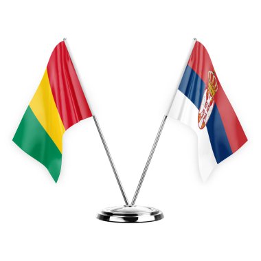 Two table flags isolated on white background 3d illustration, guinea and serbia