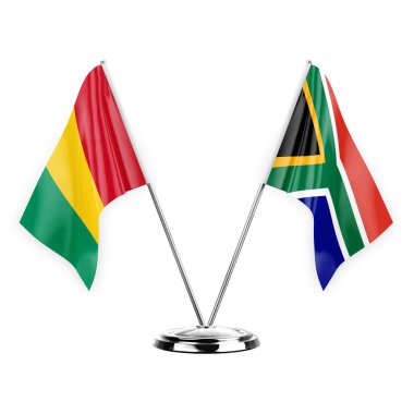 Two table flags isolated on white background 3d illustration, guinea and south africa